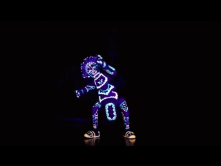 cool dance from a creepy glowing doll